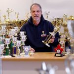 He turns your dusty old trophies into a kid’s smile